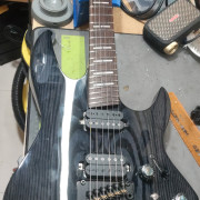 Larry Carlton X6 Headless Trans Black · Madrid · 500 €