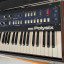Korg Polysix con placa nueva y flightcase.