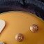 Epiphone Jared James Nichols "Gold Glory" Les Paul Custom modificada Bigsby, plásticos crema y golpeador