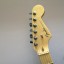 o Cambio Fender Stratocaster Am. deluxe (escucho ofertas)