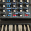 Moog Minomoog Voyager Electric Blue con flight case