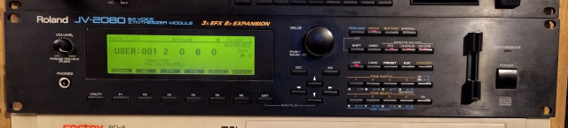 Roland JV 2080 con cuatro tarjetas de expansón RESERVADO