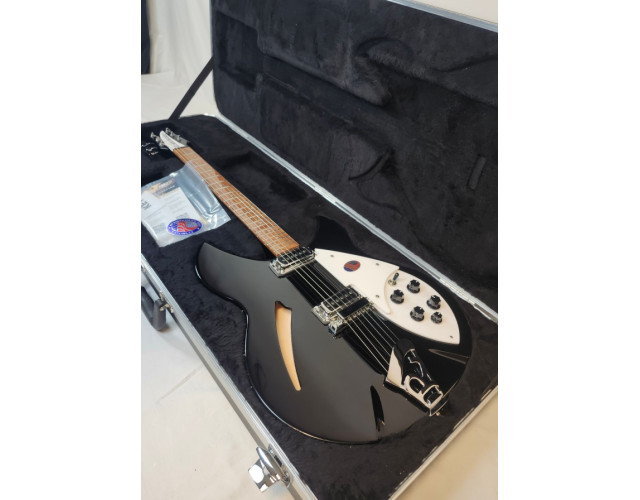 Rickenbacker 330 Jetglo 2026. Guitarra nueva aun sin estrenar.