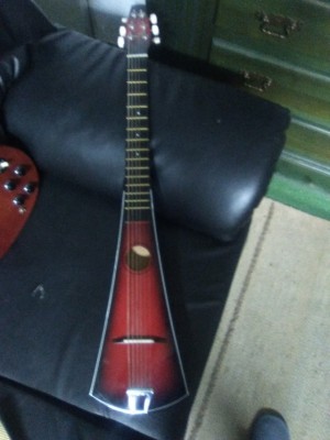 Guitarra de viaje red sunburst