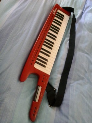 ROLAND AX1 keytar rojo
