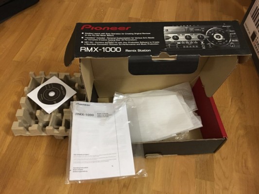 RMX 1000 con soporte, caja original y funda