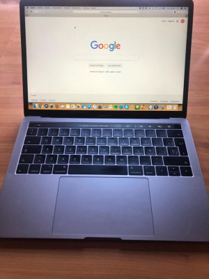 MacBook Pro 13” Touch Bar + Seguro