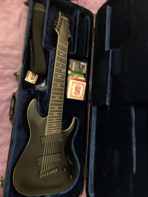 Guitarra Schecter C8 MS SLS Elite Evil Twin SBK