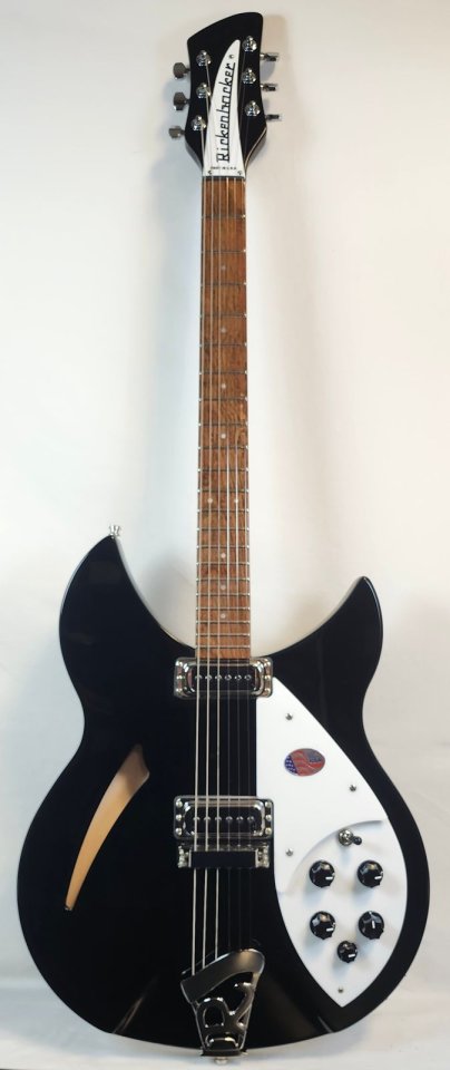Rickenbacker 330 Jetglo 2026. Guitarra nueva aun sin estrenar.