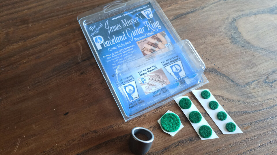 Slides de anillo James Musser Peaceland