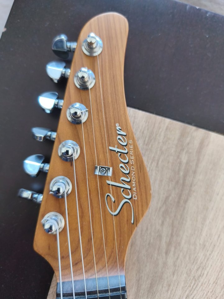 Guitarra eléctrica Schecter Diamond Series / Color Turquesa.