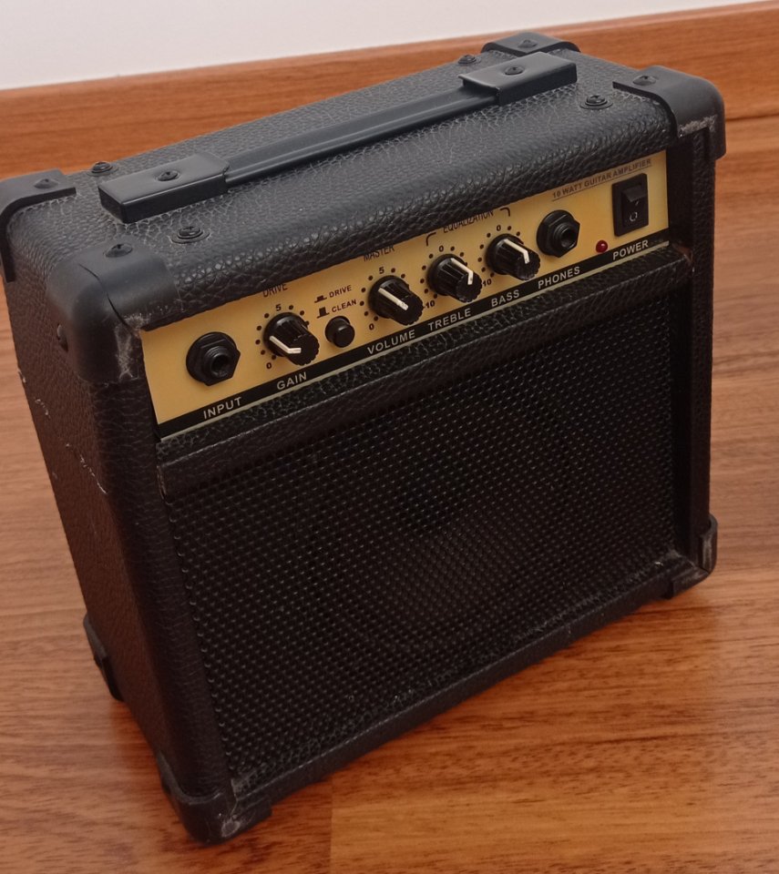 Guitarra eléctrica y amplificador de segunda mano · Foto 3 de 3 · Cuenca · 100 €