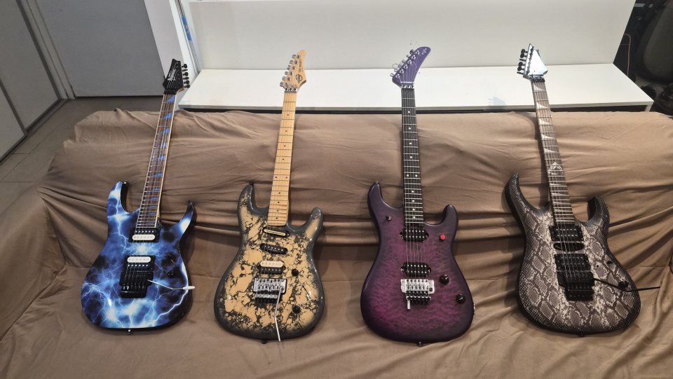 4 Guitarras
