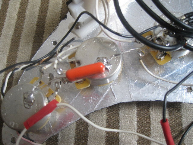 Golpeador cargado Kinman Hank Marvin Impersonator 54