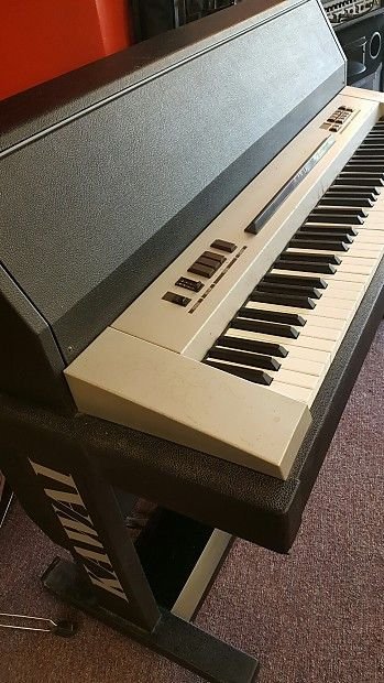 Piano electro acústico Kawai 705 M