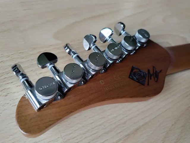 Schecter Nick Johnston SSS atomic coral