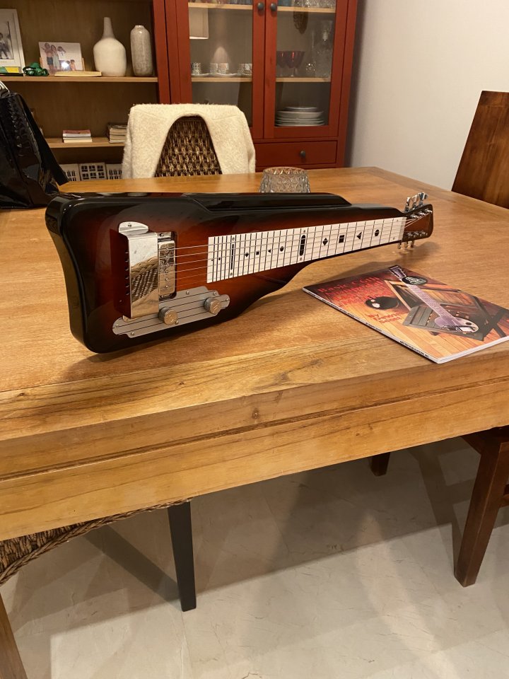 Guitarra Lapsteel Gretsch G5700 nuevo + libro