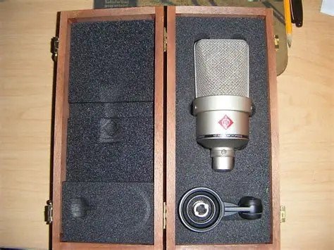 Neumann TLM 103 + Caja de madera + pinza