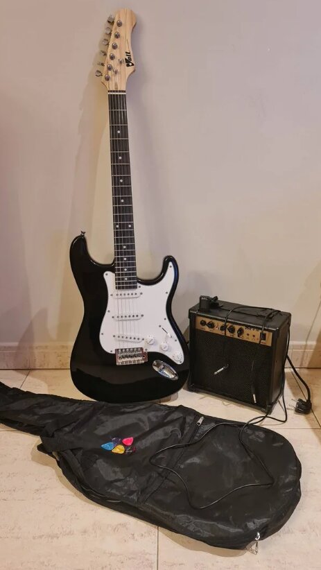 Guitarra eléctrica Volt, con ampli y accesorios